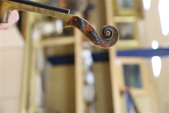 A late 19th century German violin, bears Stradivarius label, cased with bow, back 36cm